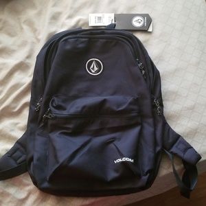 Dark blue volcom backpack